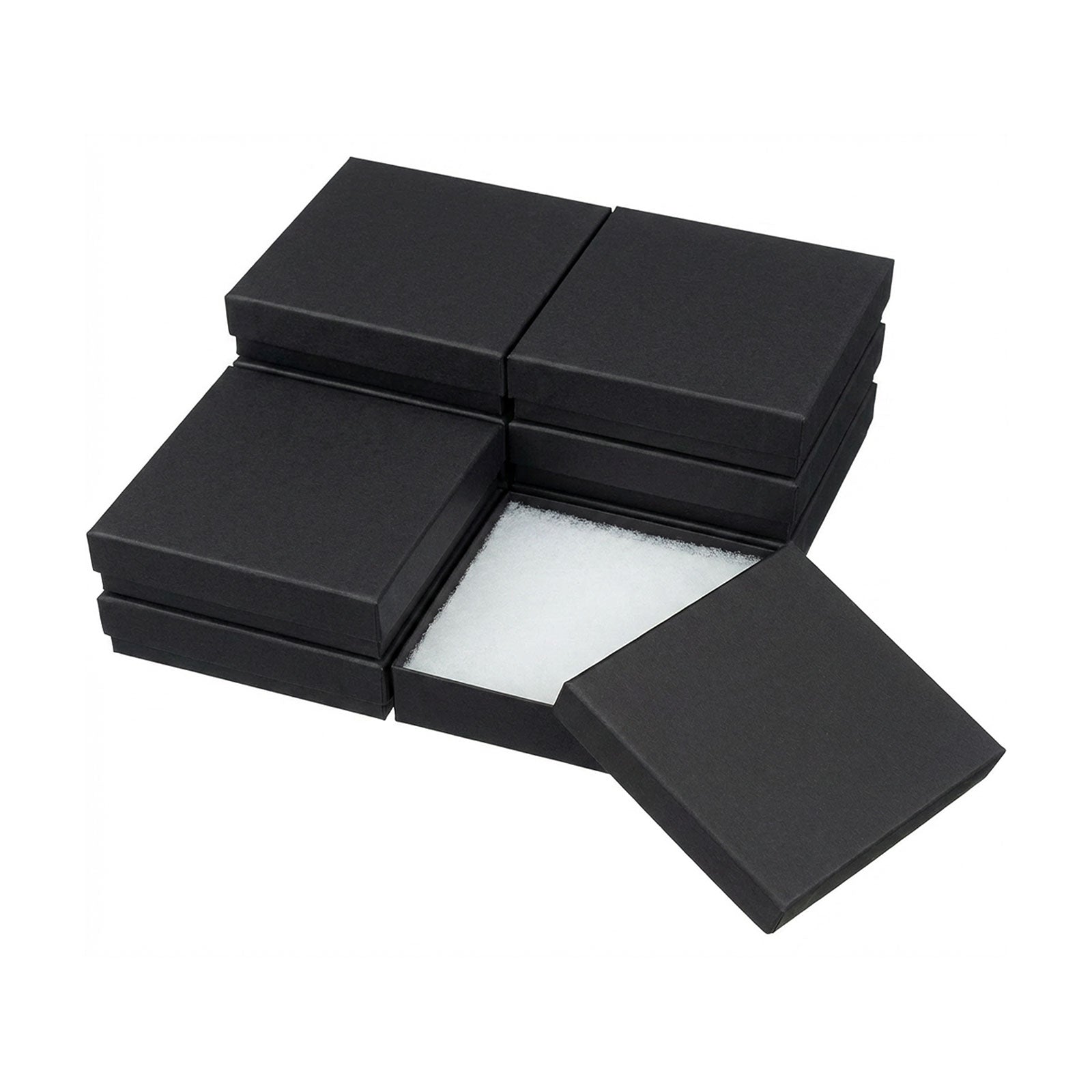 Black jewelry box with a white cotton fill interior on a white background