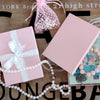 8 1/8" x 5 5/8" x 1 3/8" Pink Cotton Filled Paper Box