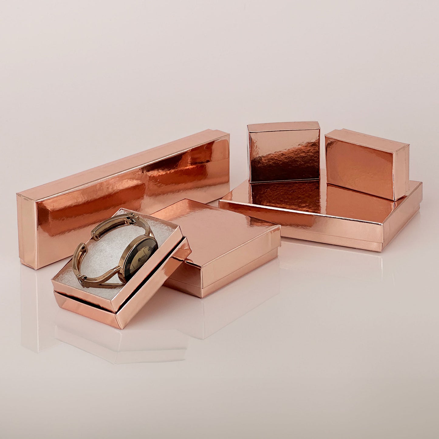 3 1/4" x 2 1/4" x 1" Metallic Rose Gold Cotton Filled Paper Box